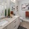 a bathroom with twin sinks and a toilet
