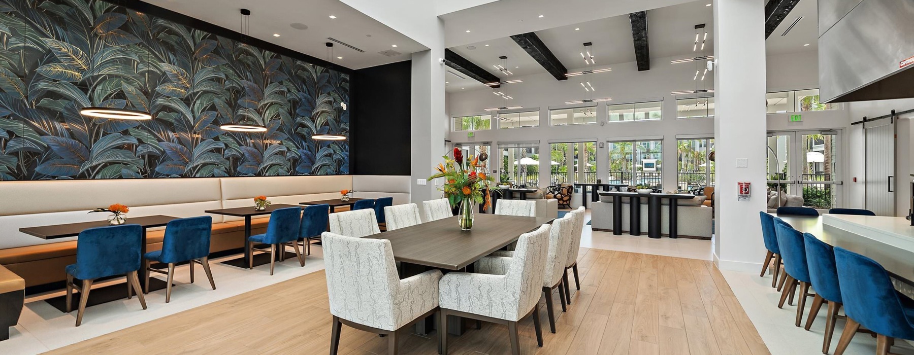 a large room with a large table and chairs