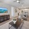 a living room with a tv and couches